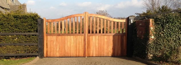 Beautiful Wooden Garden Gate With A Sun Pattern Modern Architecture Stock Photo Alamy