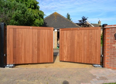 Sapele Classic gates, brown treated on underground automation system