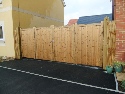 Softwood bifolding gates treated brown